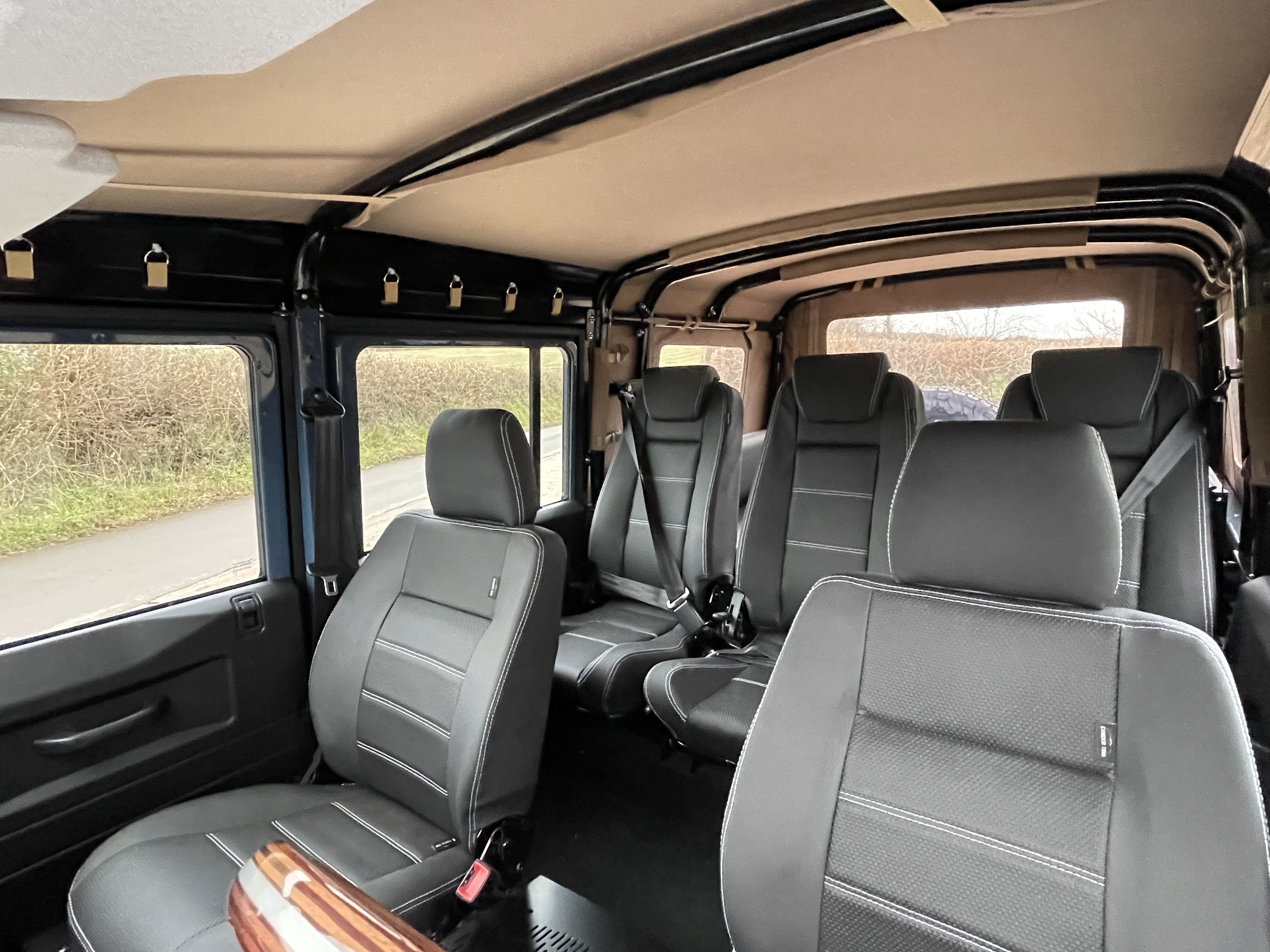 The interior of a vintage Land Rover Defender 110 Soft Top to show how the upgrades can raise the bar for your vehicle.